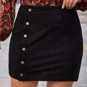 Black , poly, ribbed corduroy mini skirt - button detailing-